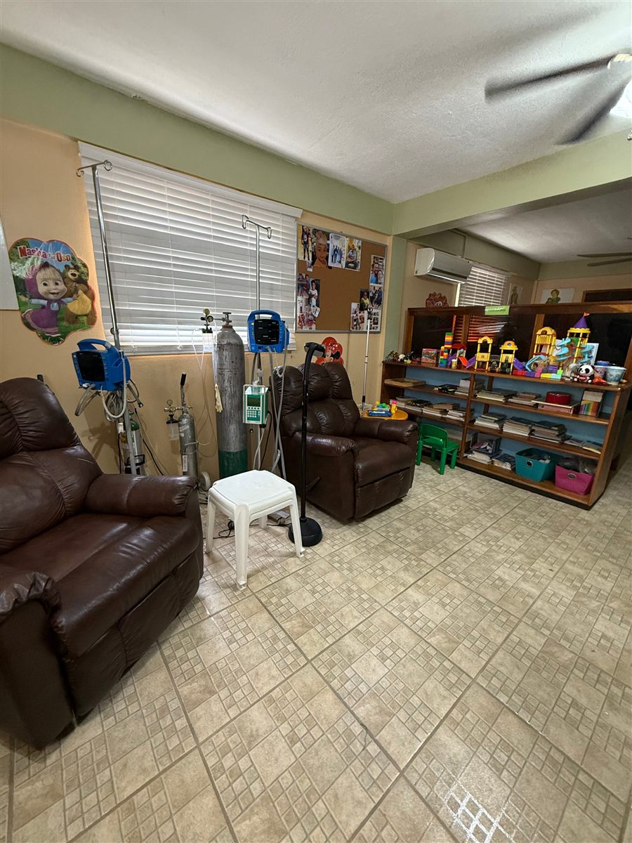 Interior of a BCCD treatment room with infusion chairs and equipment